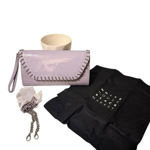 White House Black Market Purple Clutch.  new